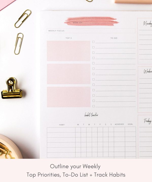Undated weekly planner notepad with task list and habit tracker for productivity.