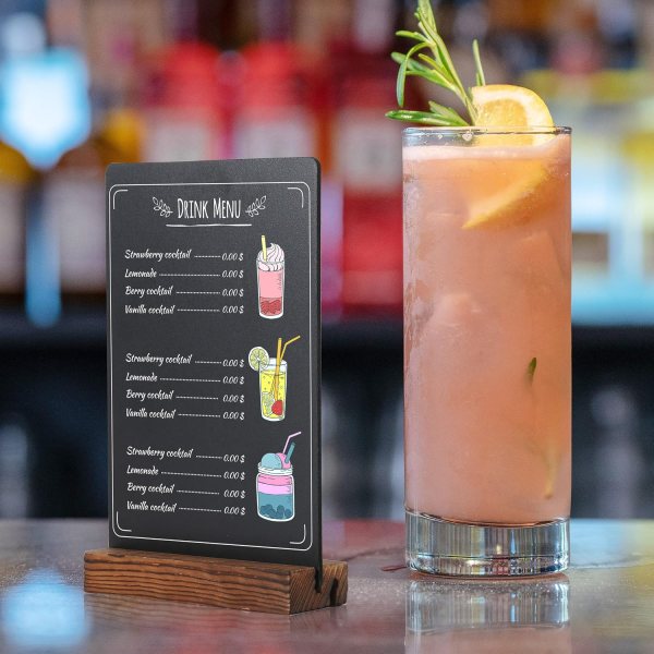 Mini blackboard menu sign with drink illustrations and wooden base.