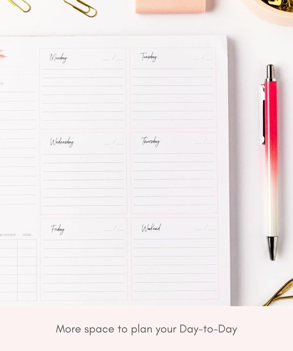 Undated desk planner with weekly layout for tasks and productivity.