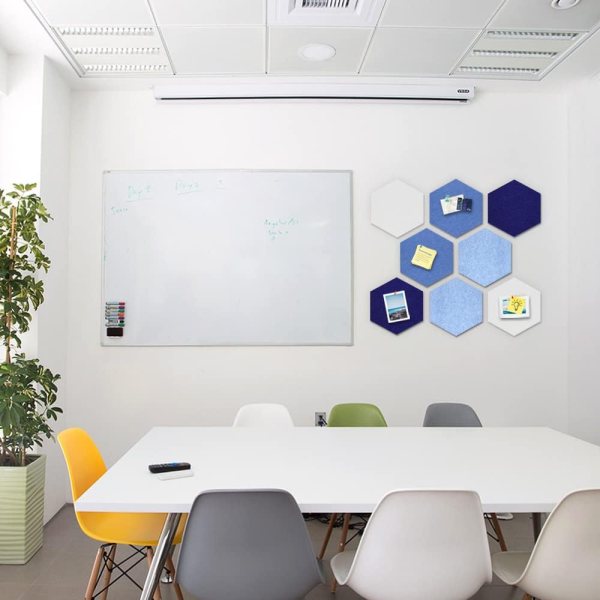 Contemporary office with hexagon wall organizer and whiteboard.