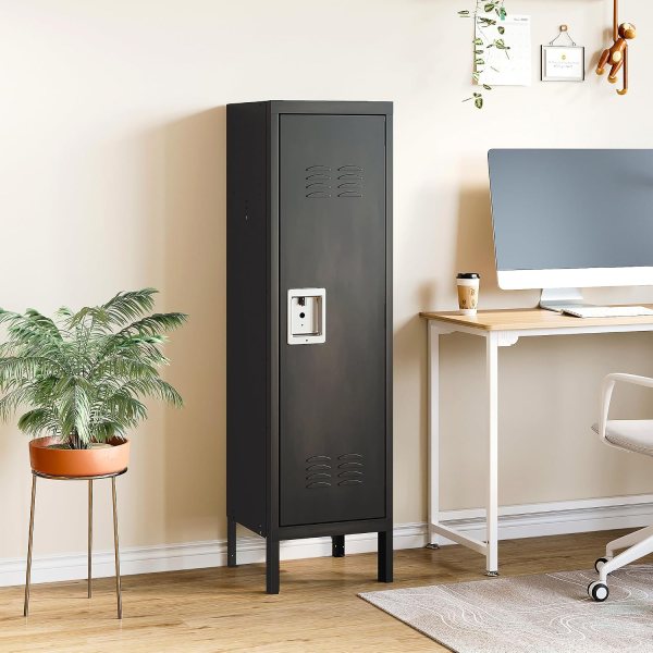 Black metal storage locker with ventilation and lock in office setting.