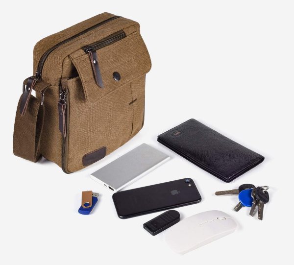 Brown messenger bag with laptop, phone, keys, and accessories for work.