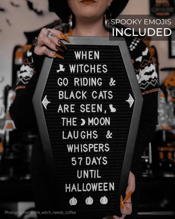 Black felt Halloween message board with white letters and spooky emojis for gothic decor.