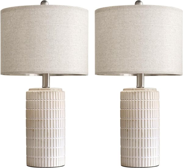 Elegant beige and white porcelain nightstand lamps for bedroom and living room.