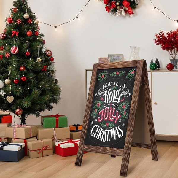 Festive Christmas chalkboard sign with holiday message and decorations.